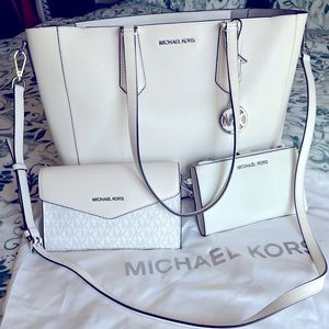 Michael Kors 4 piece set. Like new w/out tags